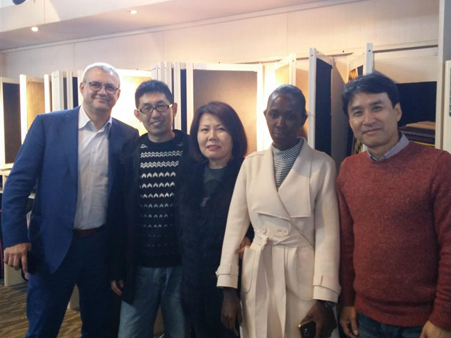 Sample room and customer group photo